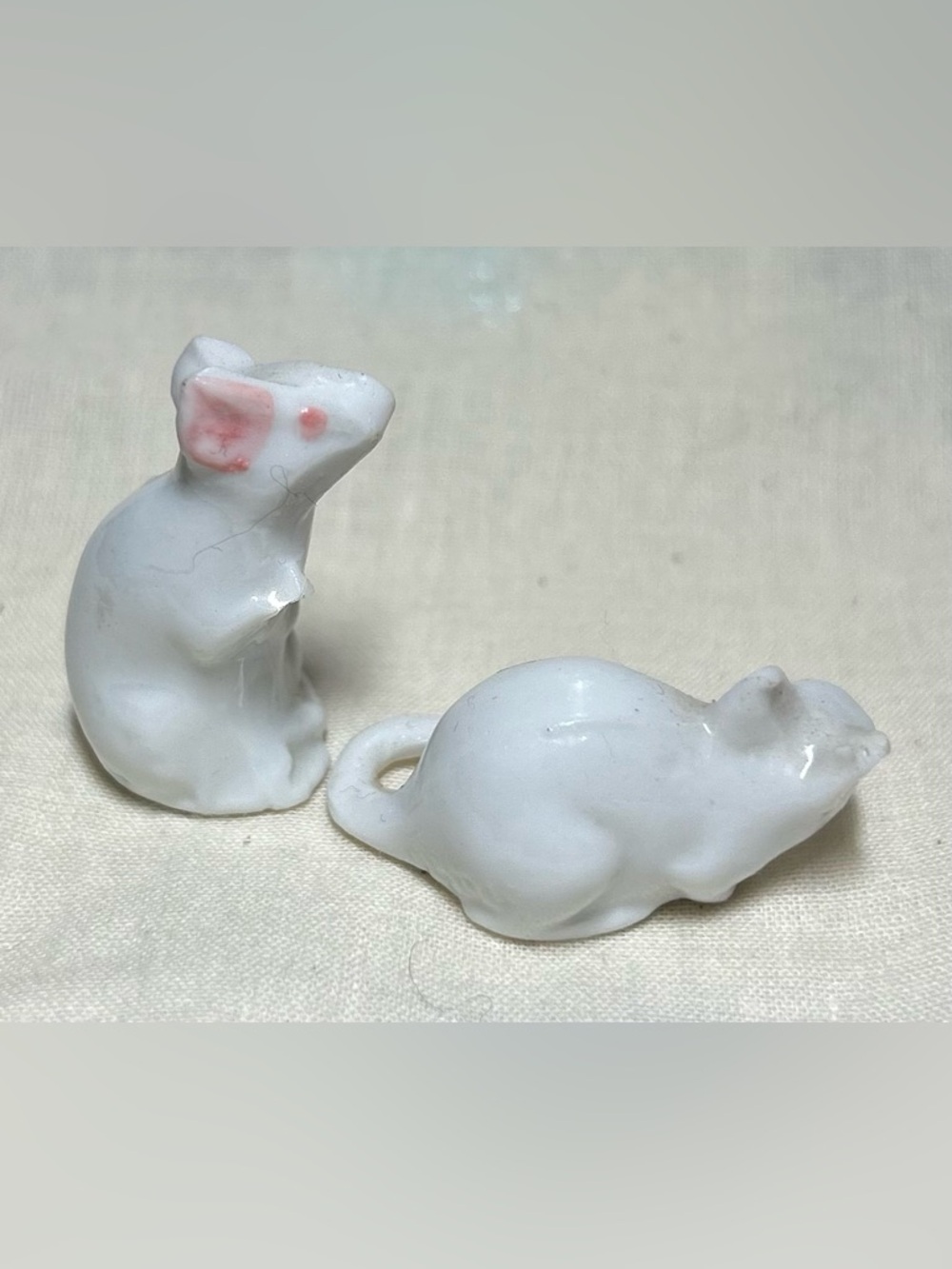 White Porcelain Mouse Figurines with Pink Ear Detail